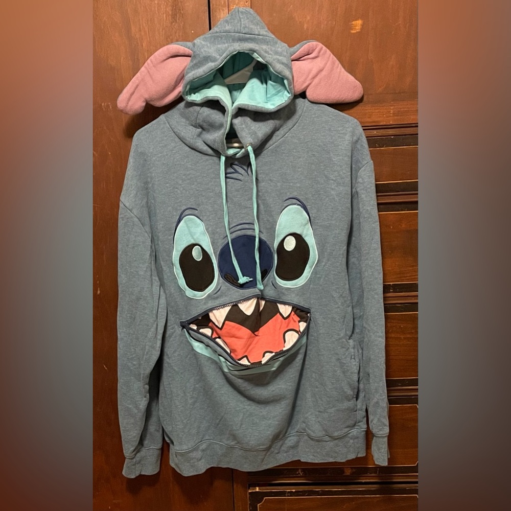 Disney Stitch Hoodie with padded ears and zipper mouth
Size M